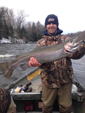 Winter steelhead trout fishing on the Salmon River from a heated drift boat