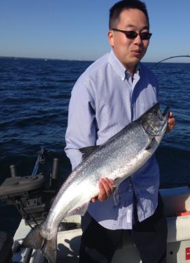 Charter boat fishiing on the easter basin of Lake Ontario for trout and king salmon, near the Salmon River, Pulaski NY