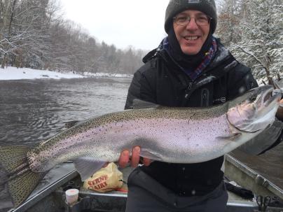 Heated driftboat fishing down the Salmon River in Pulaski Ny for steelhead trout.