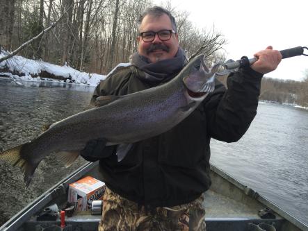 Heated driftboat fishing down the Salmon River in Pulaski Ny for steelhead trout.