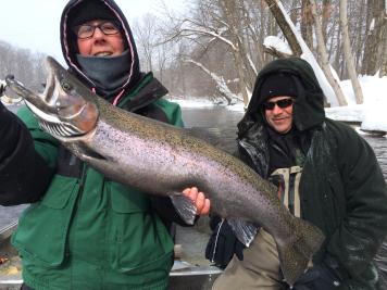 Heated Drift boat fishing down the Salmon River in Pulaski Ny for steelhead trout