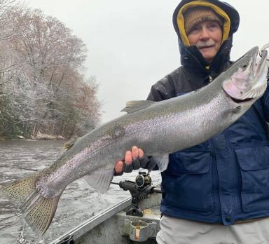 big steelhead caught out of a driftboat